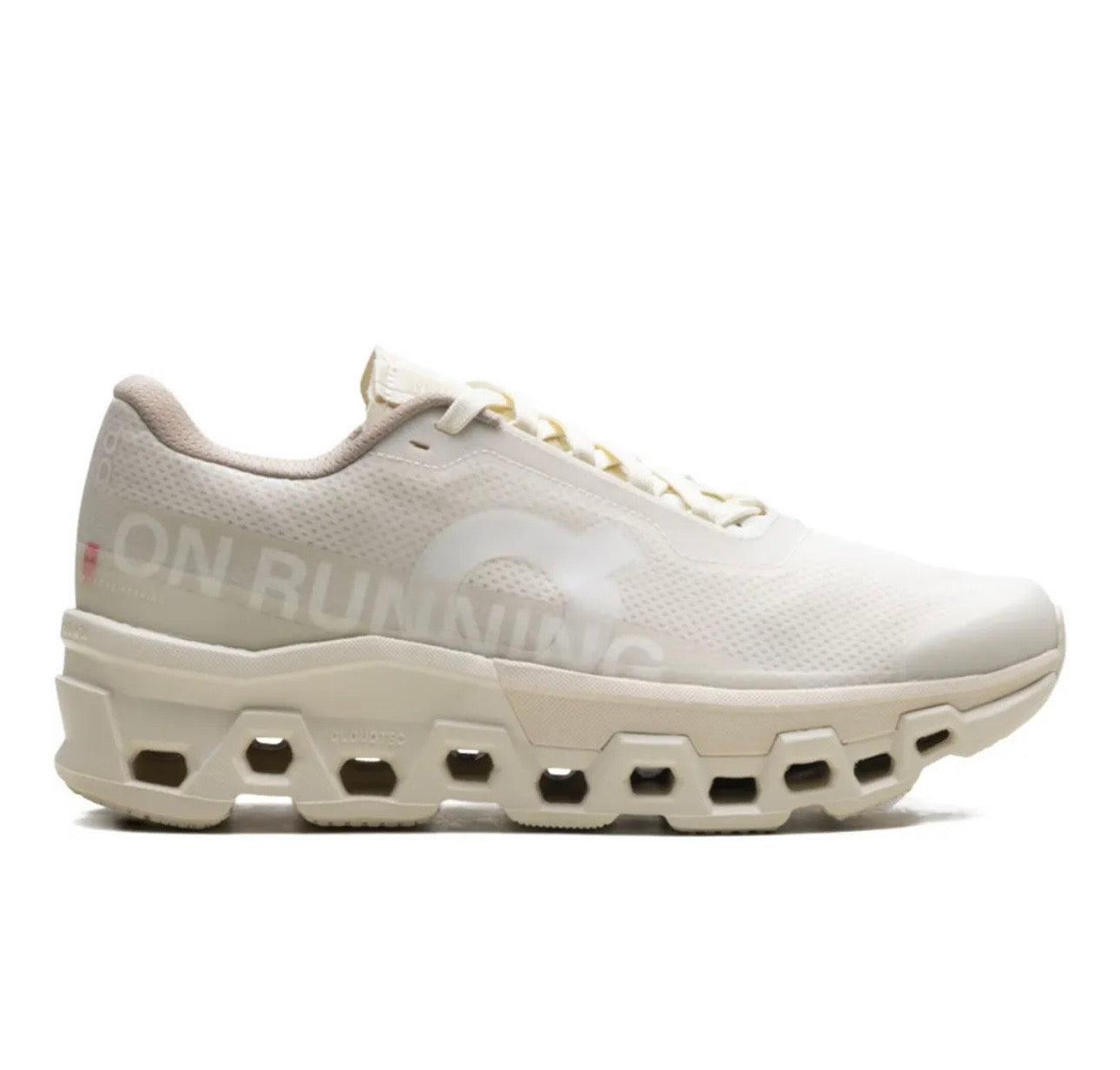 On Cloudmonster cream - high-performance athletic footwear with advanced cushioning